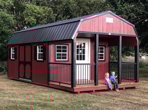 High barn shed with a porch used as a portable cabin in ia